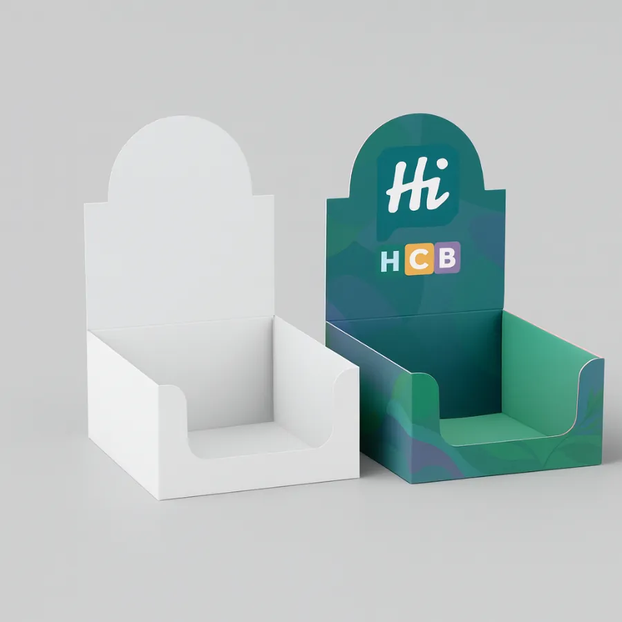 White and printed retail display boxes with a wide front cut-out and rounded backer- class=